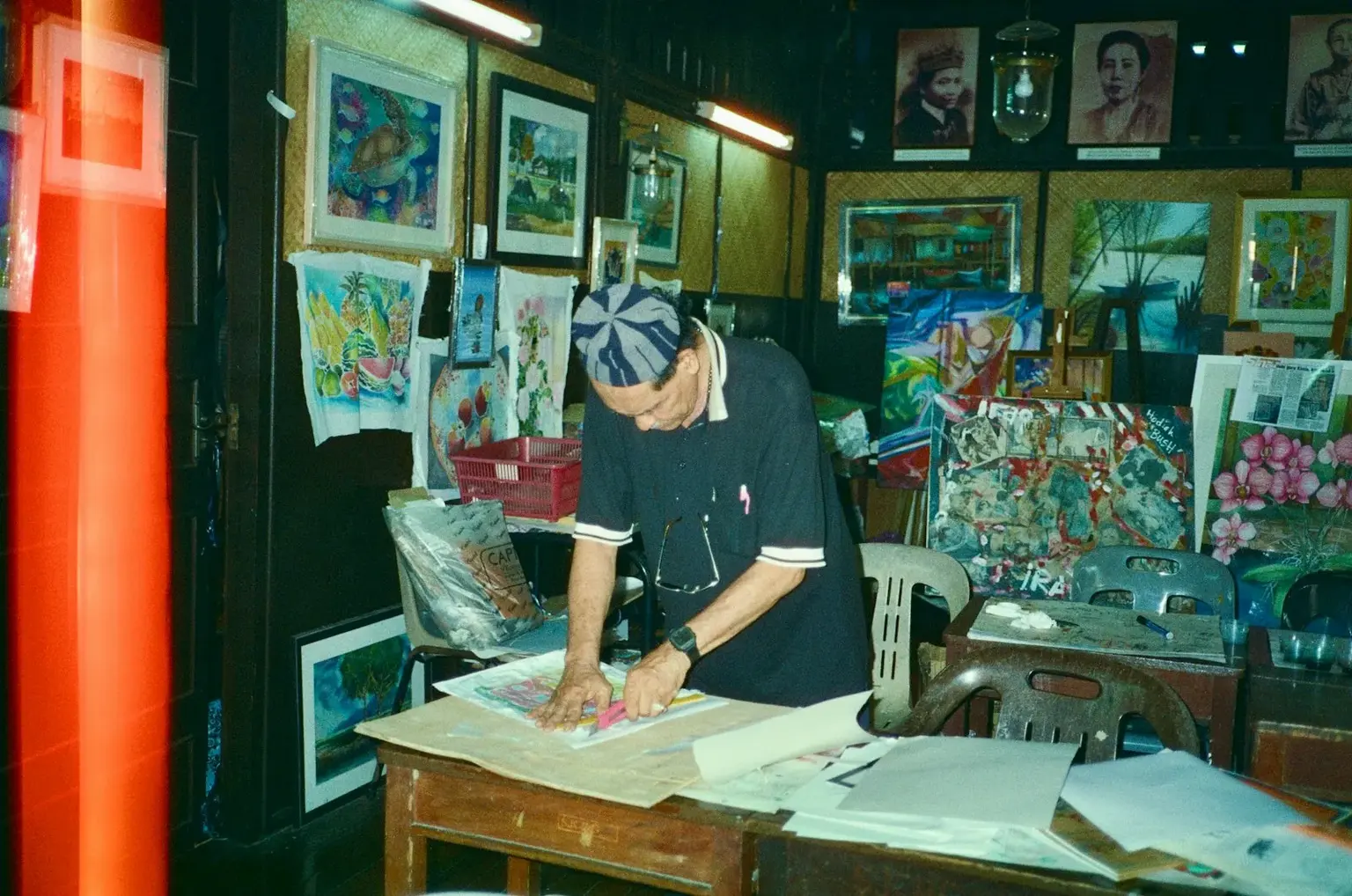 An artist at work in a Malaysian studio